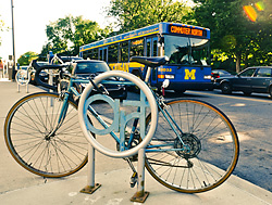 The U of M Commuter Bus driving through Central Campus