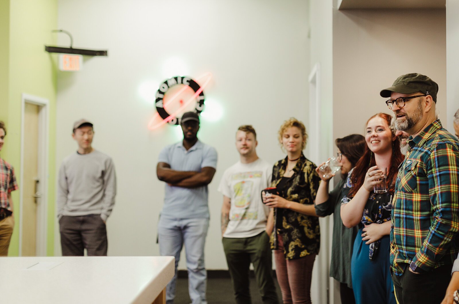 Atomic Object Managing Partner Jonah Bailey is pictured at right in an Atomic Object staff meeting.