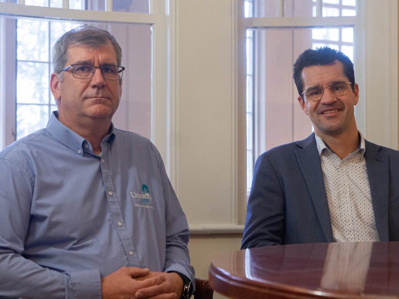 Ken Sprinkles, University Bank business banking officer, and Benjamin Bolen, University Bank wealth advisor.