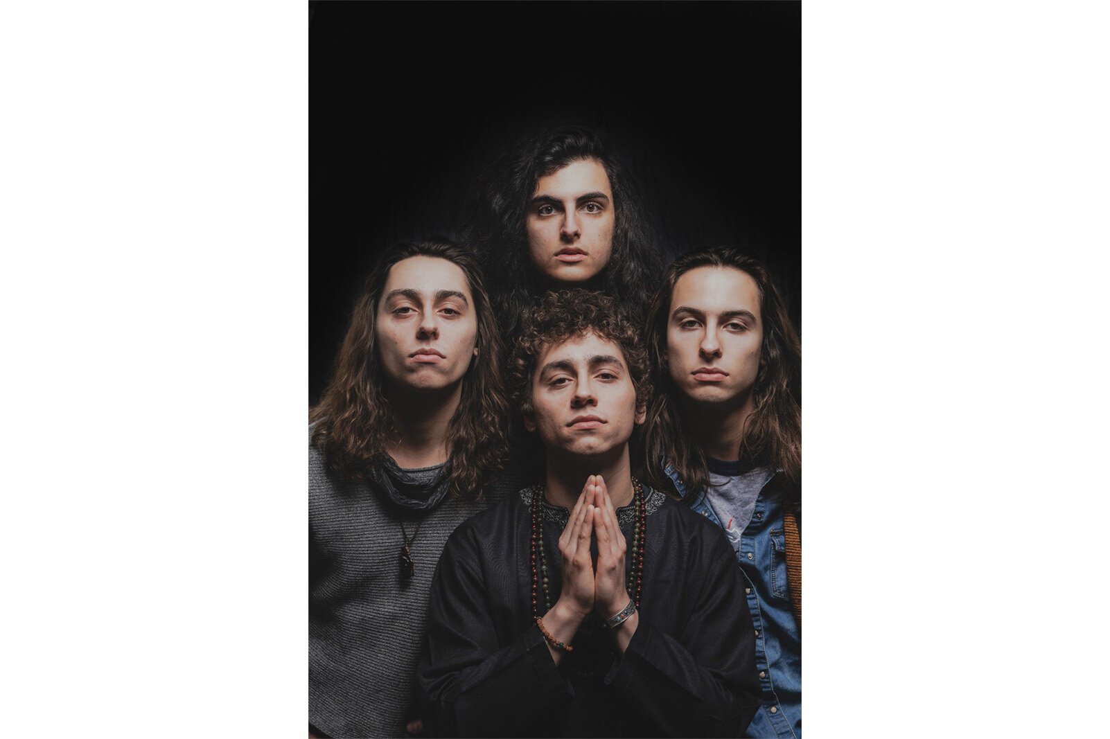 Greta Van Fleet photographed by Doug Coombe.