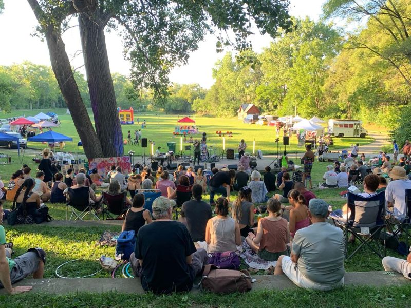 People watch a band play at Fun Fest.