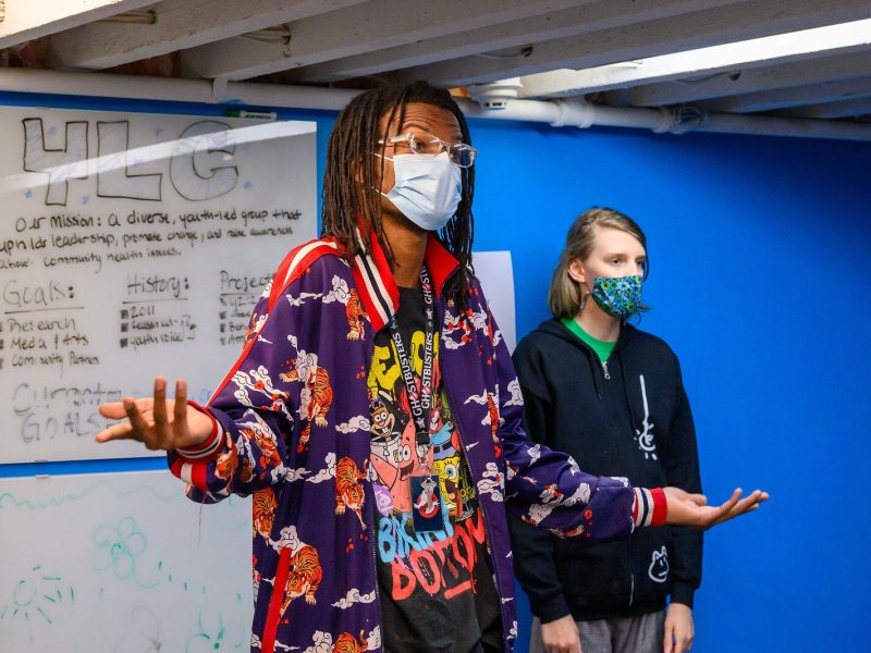Actors Josiah Jones and Onyx Ellerthorpe rehearse "This Is Real," a short play about mental health, at Corner Health Center in Ypsilanti.