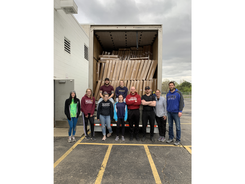 BankSupplies staff after finishing packing a truck full of germ shields.