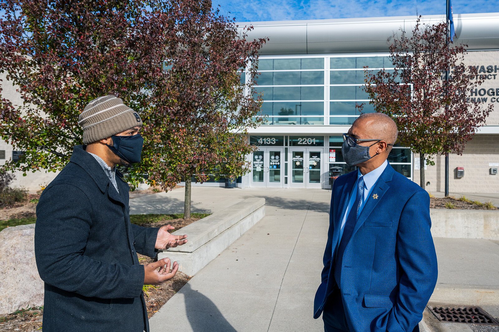 Police Reform Academy cohort member Justin Harper and Derrick Jackson, director of community engagement for the Washtenaw County Sheriff's Office.