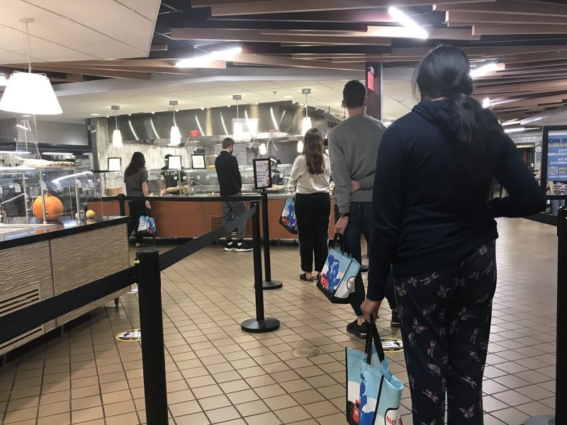 Students line up at a U-M dining hall.