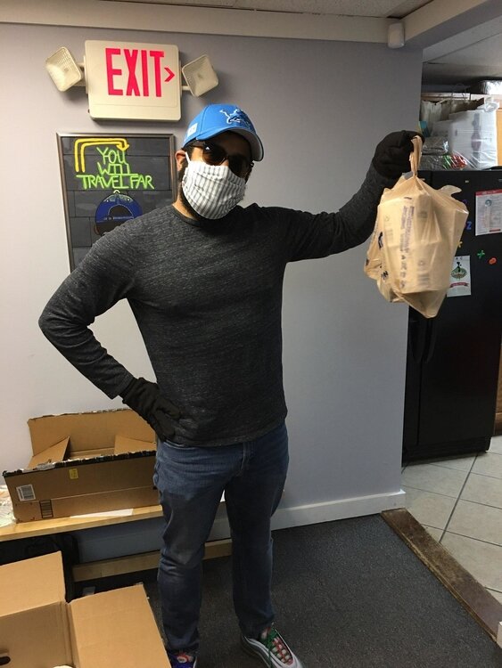 SAC mentor Al Correa prepares to make a delivery to a client.