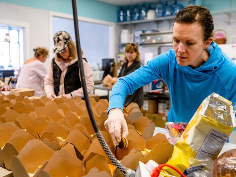Megan Turriff prepares a school lunch at Eat More Tea.