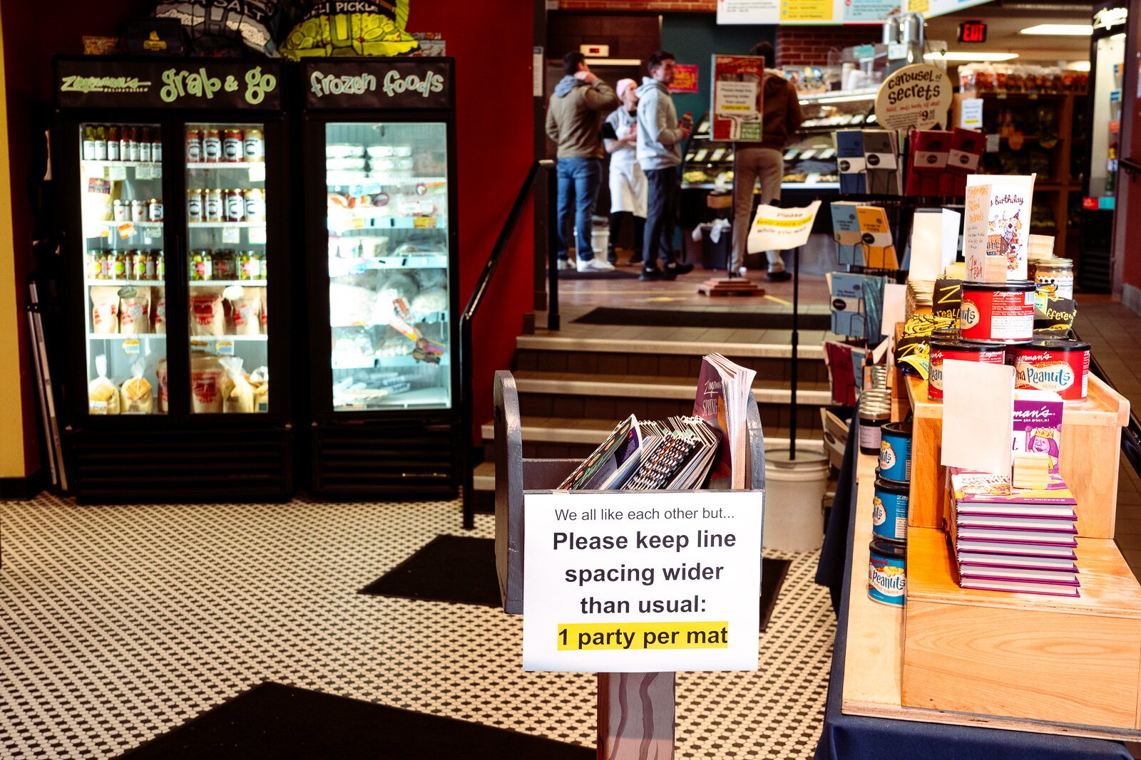 Mats are placed at six-foot intervals at Zingerman's Deli.