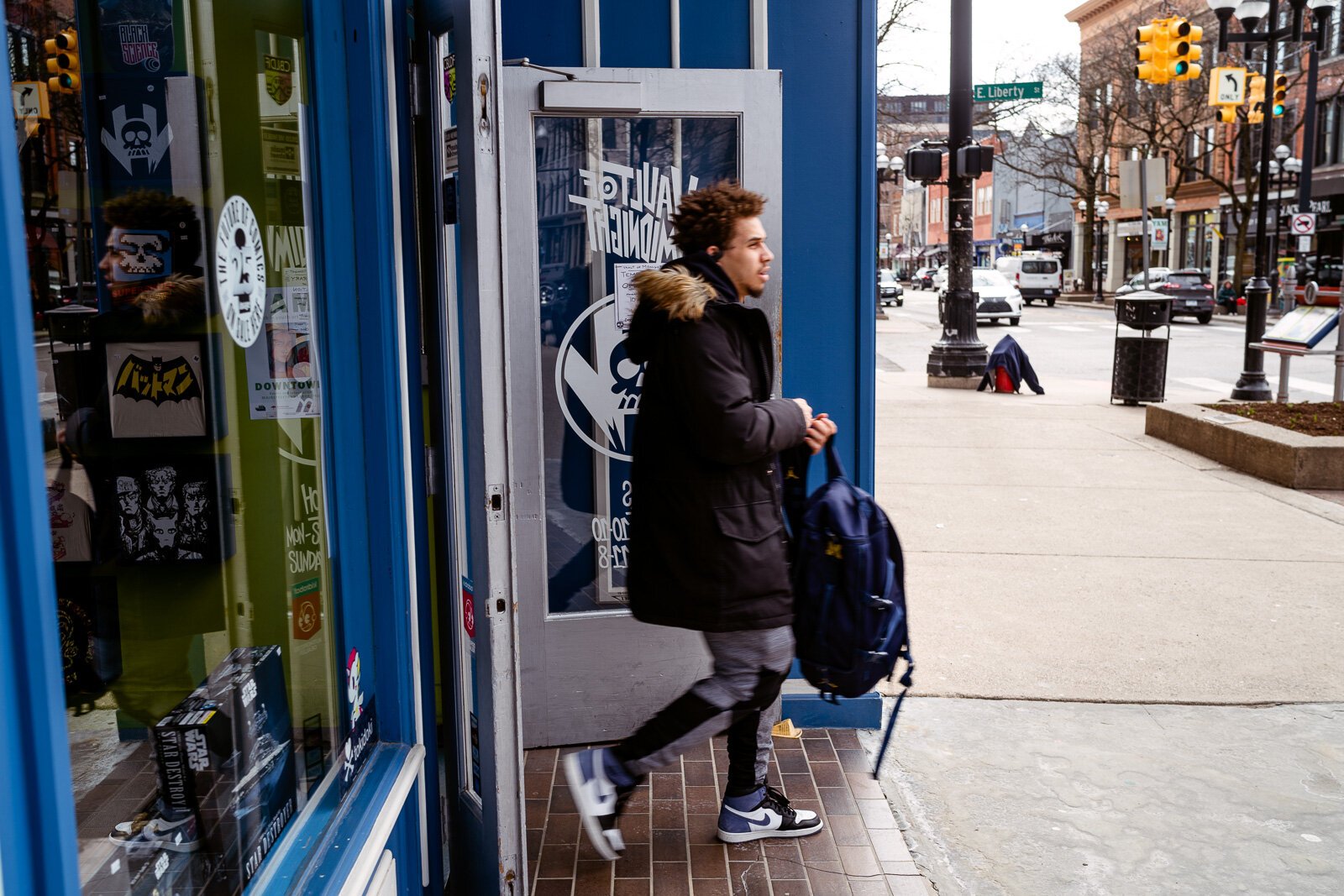 A customer leaves Vault of Midnight.