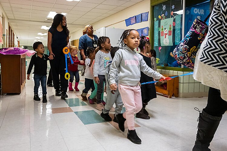 Children with Bottles-N-Backpacks at the Chapelle Business Center.