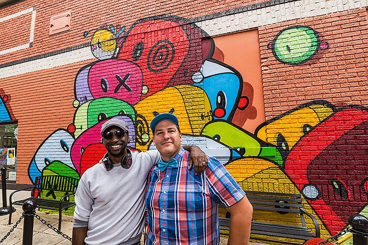Gary Horton and Rob Hess in front of Gary's mural at Go! Ice Cream.