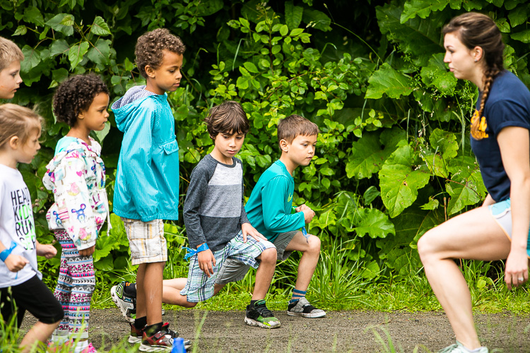 Participants warm up at Frog Island Track Club.