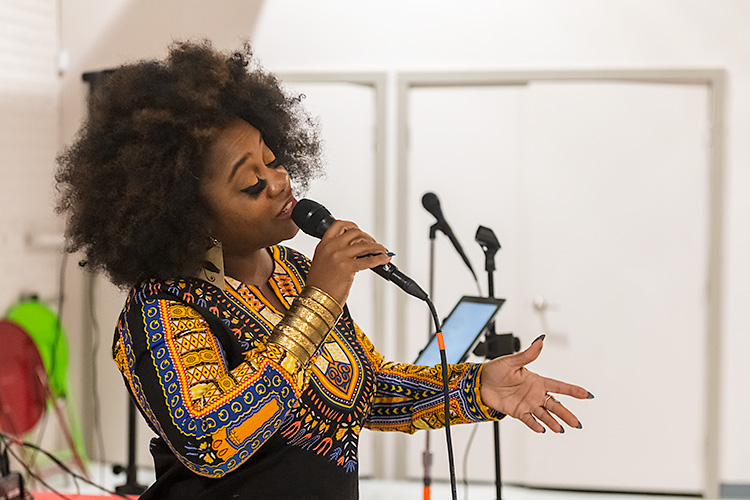 Athena Johnson performs at the Black Empowerment Awards. She often performs with the vocal group Dames Brown.
