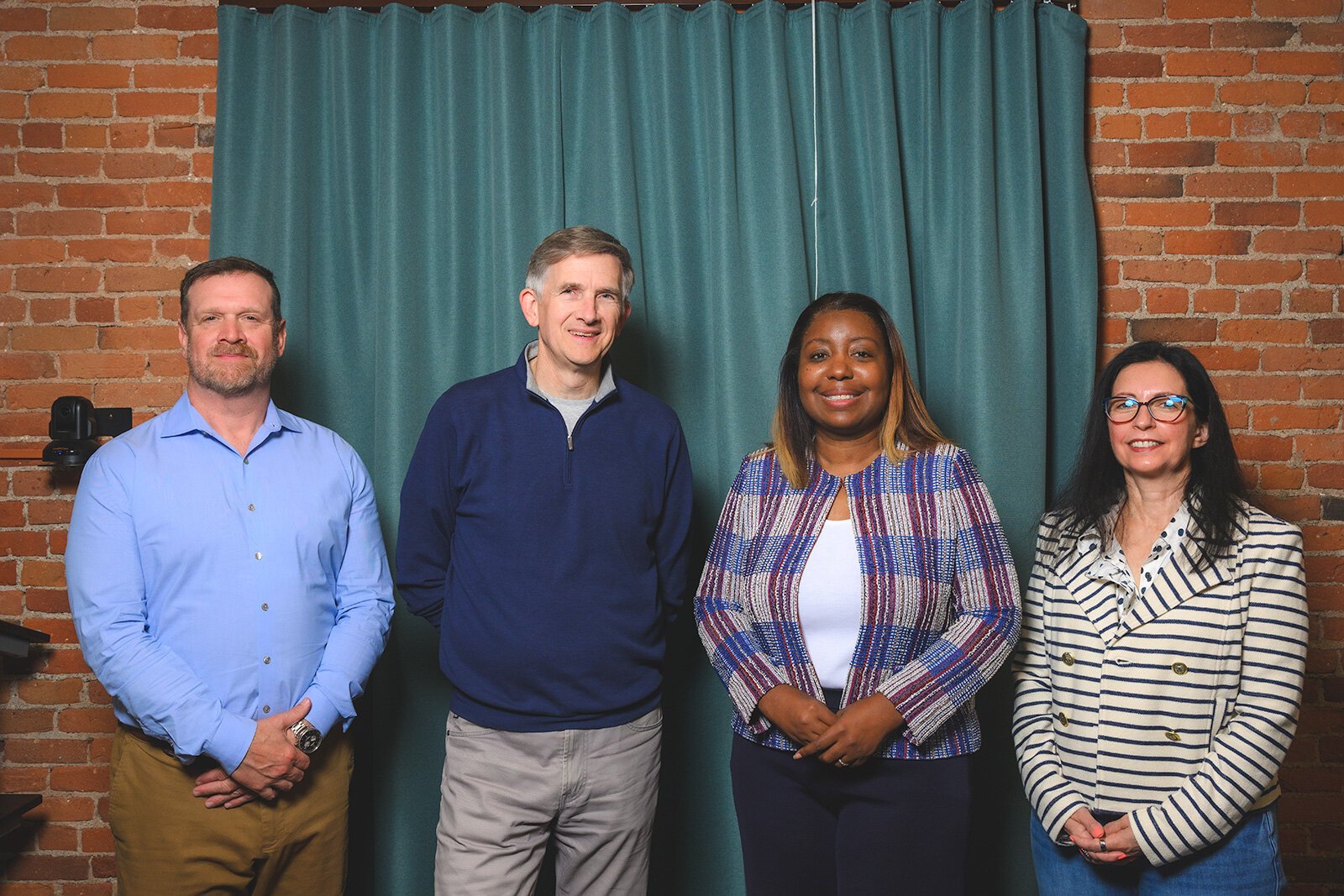 Ann Arbor Area Community Foundation Vice President for Community Investment Christopher Lemon, CFO Jamie Hunter, President and CEO Shannon Polk, and Impact Investing Manager Frances Todoro-Hargreaves.