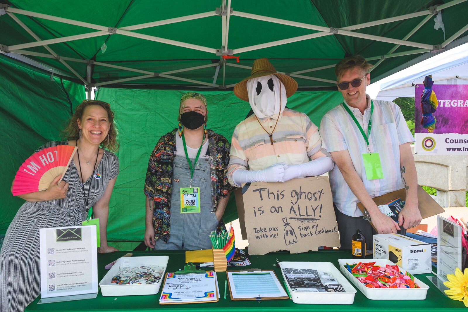 Alexis Braun Marks, Finn Vicent-Fix, and Matt Jones of the Eastern Michigan University Archives with Ypsi Pride Ghost attendee.
