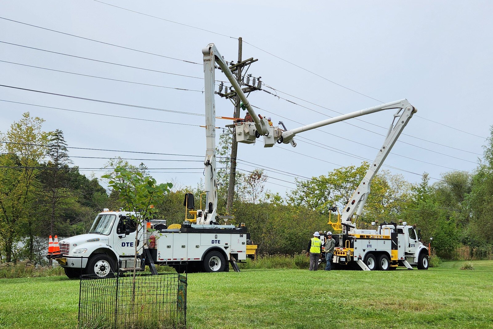 DTE workers make upgrades to power lines near Dixboro in fall 2024. The utility says it is investing $200 million in Ann Arbor's infrastructure over the next five years. But the city is pushing back against DTE's request to raise electricity rates.