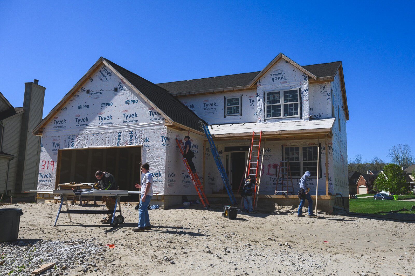 Homebuilding students work on their current house.