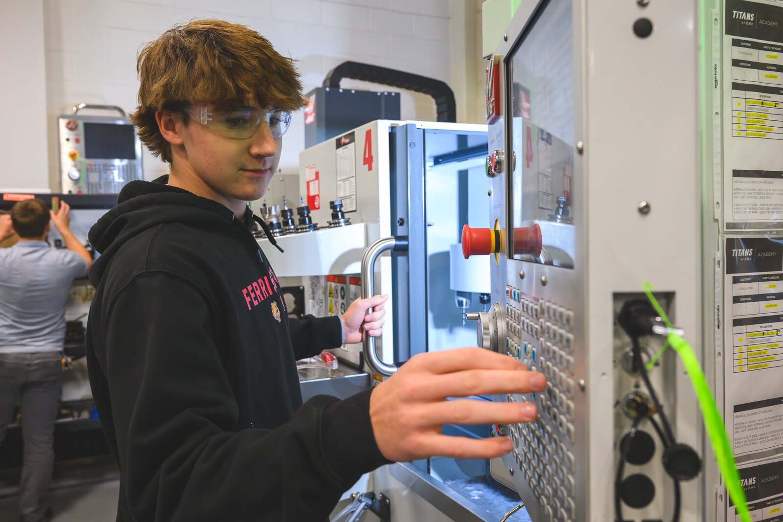 Ryan Friedholm working in Computer Integrated Manufacturing class at Saline High School.