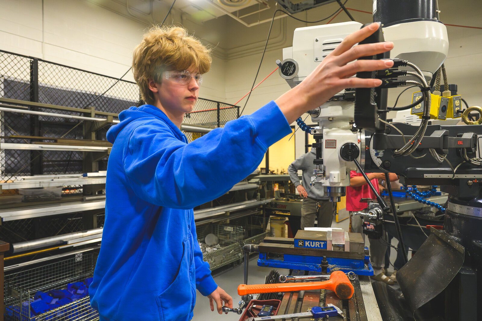 Caleb Dahl working in Computer Integrated Manufacturing class at Saline High School.