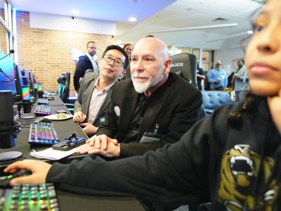YCHS Director of Technology Solomon Zheng, YCHS Assistant Superintendent Dr. Carlos Lopez, and YCHS junior Arianna Maldonado.