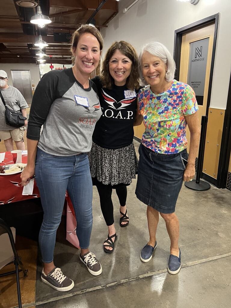 Rachel Rowe, Lori Lichtman, and Peg Talburtt at a SOAP (Save Our Adolescents from Prostitution) event.