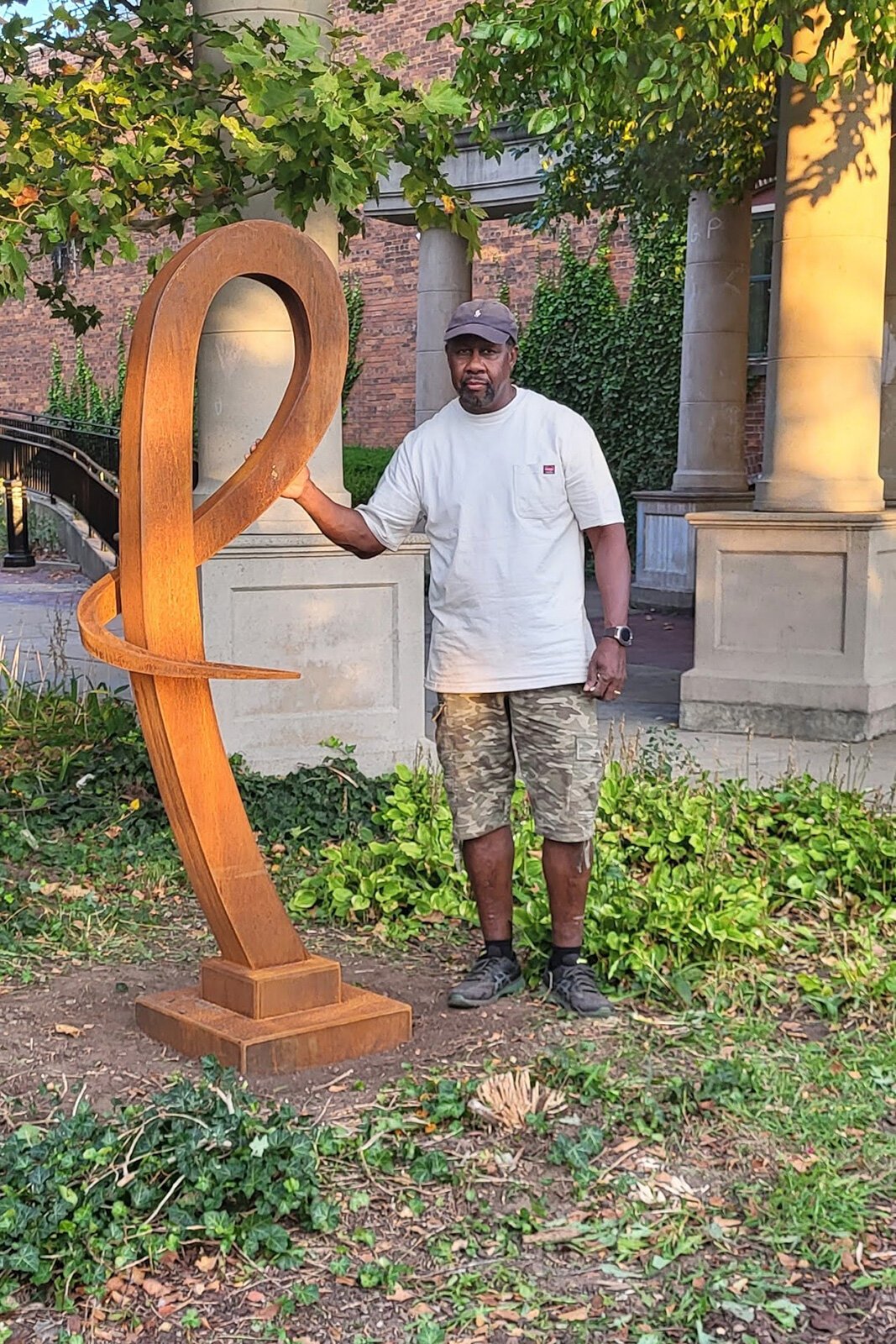 Bryant Tubbs with the sculpture RIBBONS at RAC.