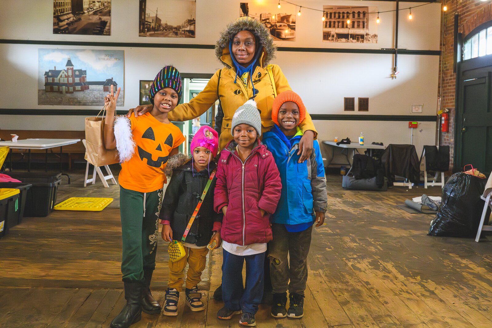 Saprina Morris with her children Lizzianna, Deanna, Dontae, and Destiny at the Ypsilanti Freighthouse daytime warming center.