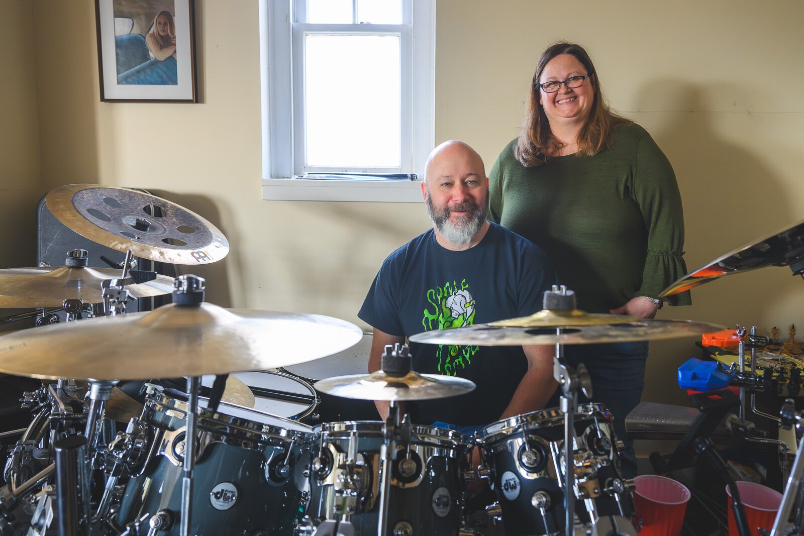 "The Drumbeat with Josie and Pete" podcast hosts Peter Martel and Josie Ann Lee.
