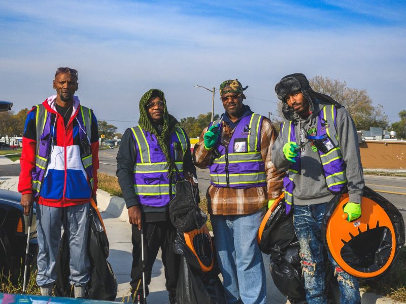 SHINE team members Willie Percy, Louis Printup, Leroy Harris and Eric Martin cleaning on Ecorse Road.