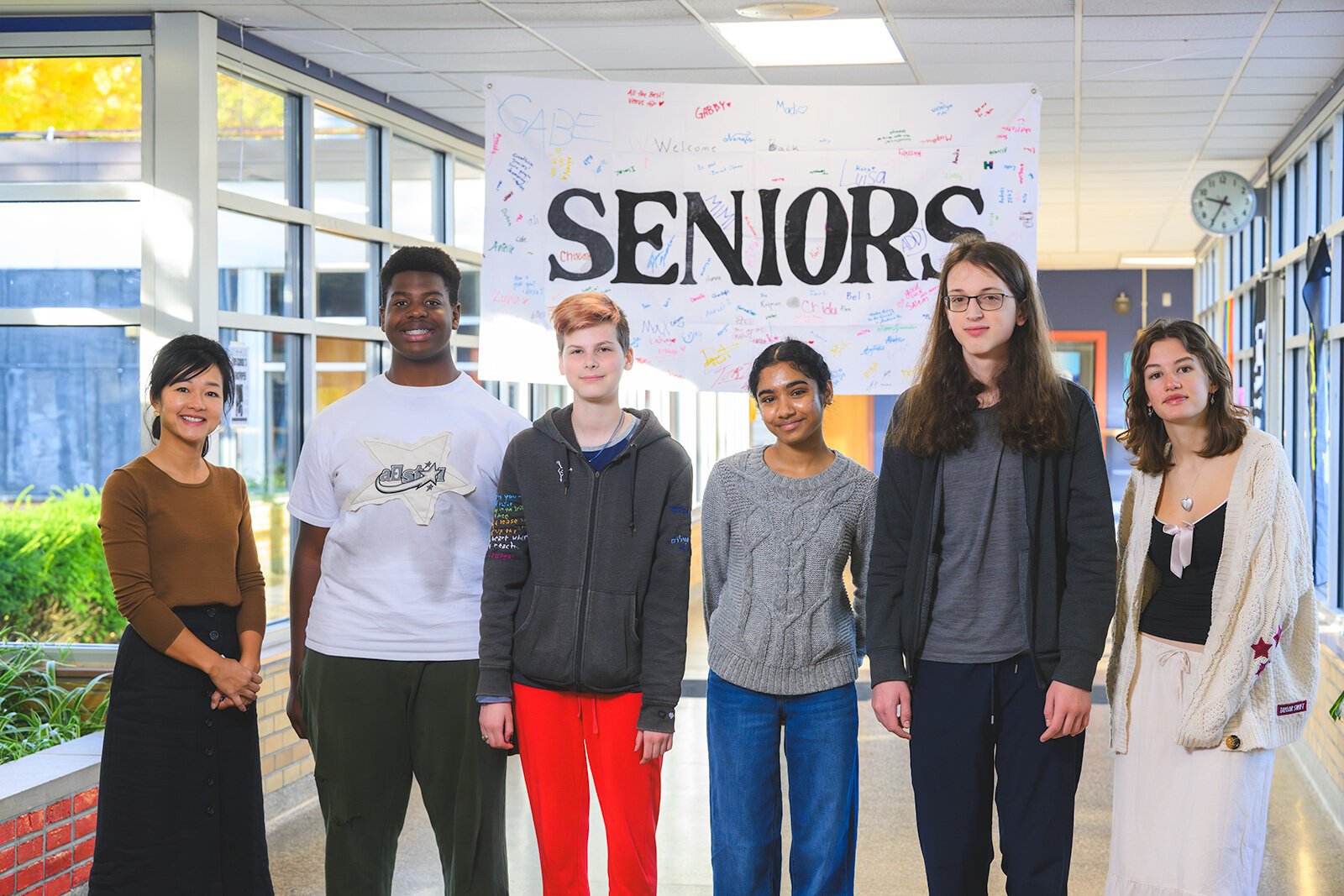 WIHI/WIMA Principal Nhu Do with students Obinna Okammor, Nome Berman, Hasini Anand, Nadav Dueber, and Charlotte Stone.