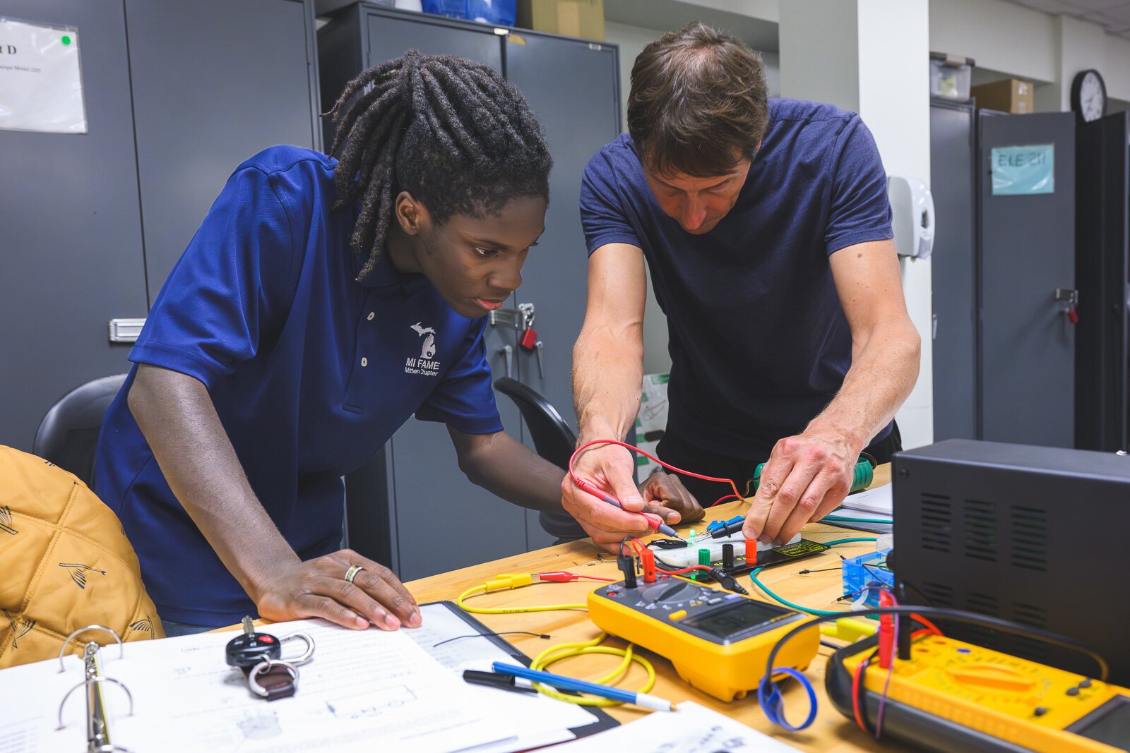 FAME program student Darrius Johnson (left) and Mike Ozerdier in Basic Electronics class at WCC.