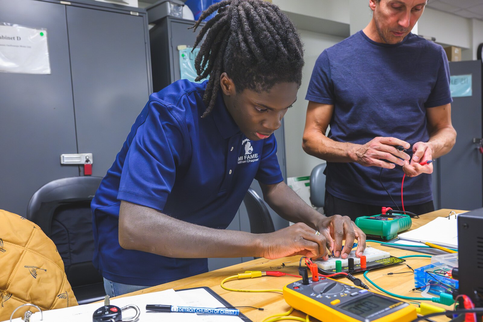 FAME program student Darrius Johnson (left) and Mike Ozerdier in Basic Electronics class at WCC.