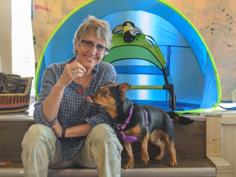 Depot Town Cats and Dogs owner Holli Andrews with Levi.