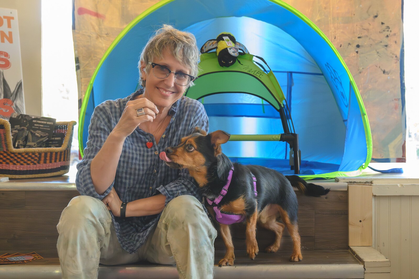 Depot Town Cats and Dogs owner Holli Andrews with Levi.