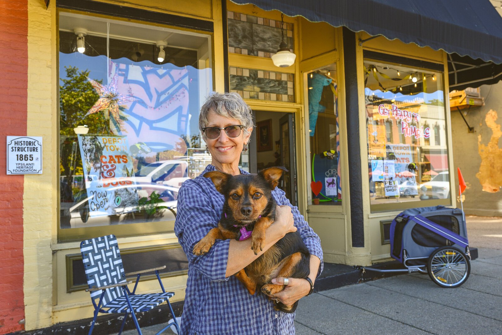 Depot Town Cats and Dogs owner Holli Andrews with Levi.