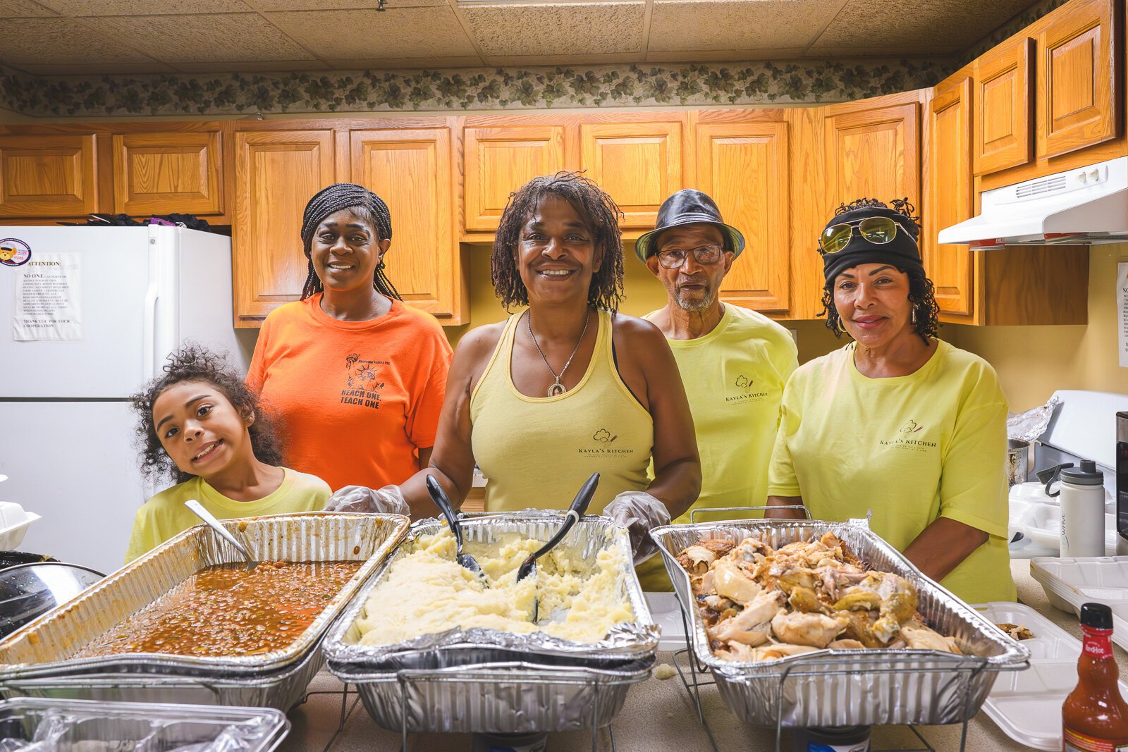Aleya Cullins, Sonya Townshend, Lisa Barfield, Jimerele Hawkins, and Bonnie Lawrence serving meals at Chidester Place.