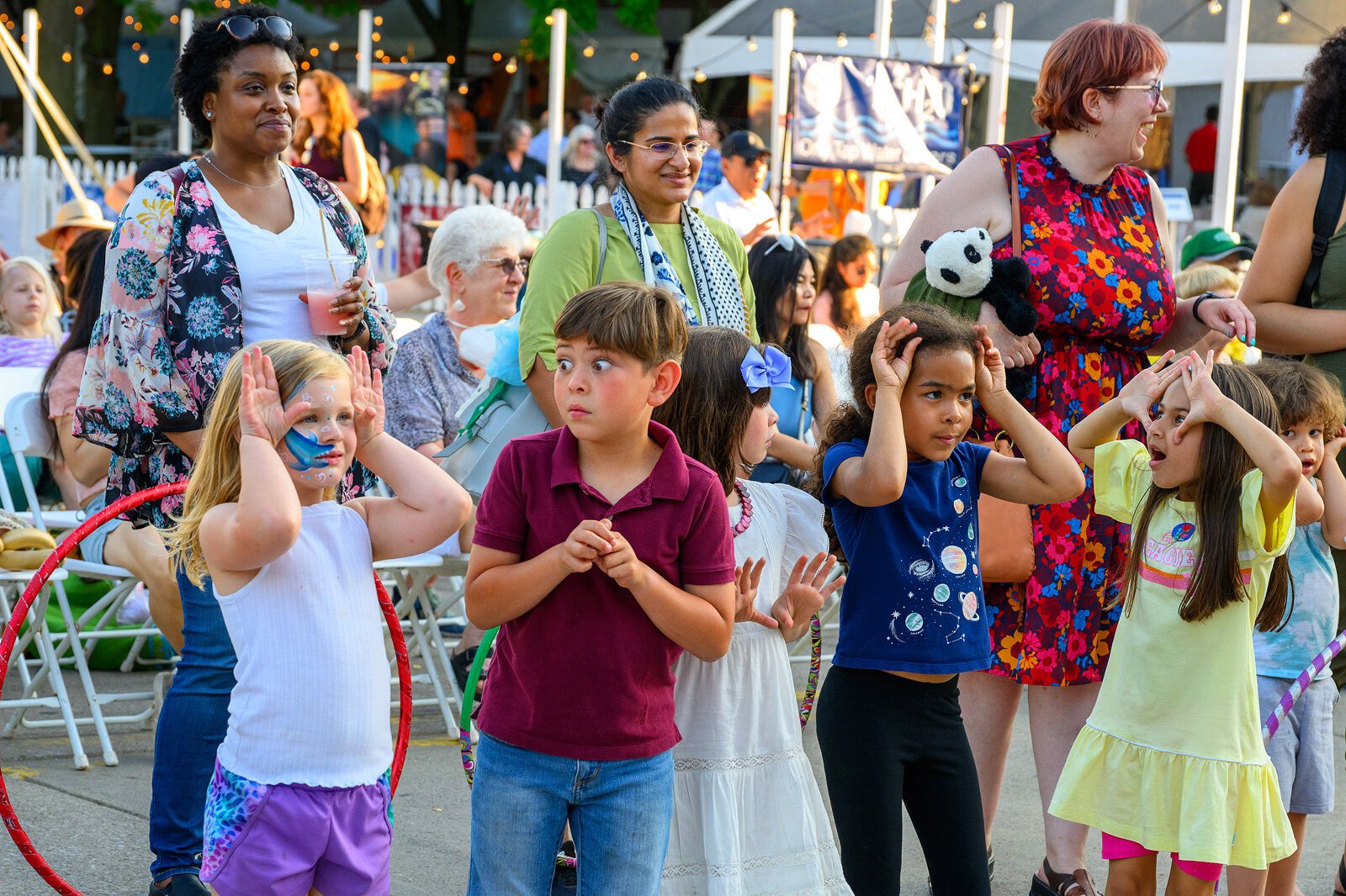 Kids enjoying Miss Paula and the Candy Bandits at Ann Arbor Summer Festival in 2022.