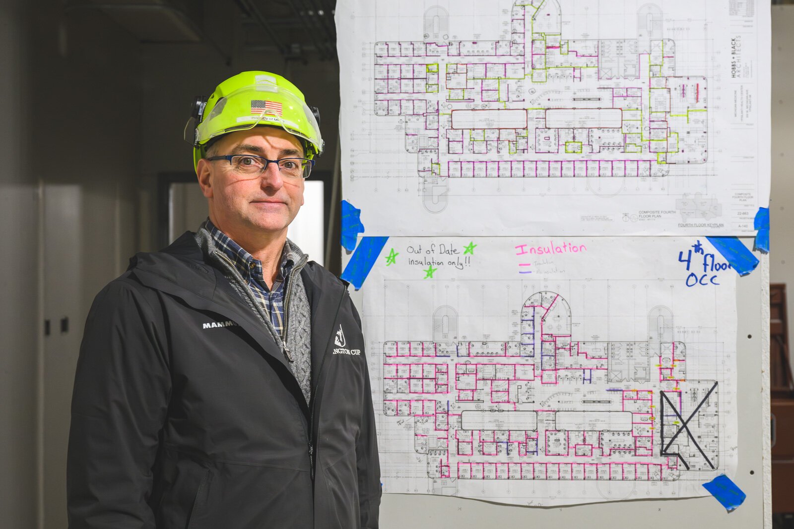 MI-HQ President Mark Smith at the former EMU Gary Owen College of Business under renovation.
