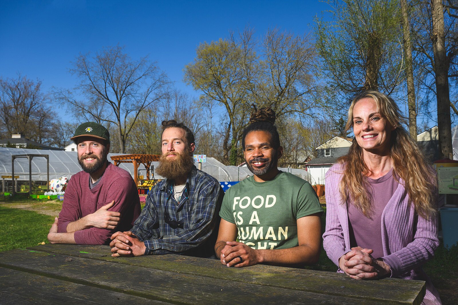 Doug Reith, Christopher Hallett, Julius Buzzard, and Rebecca Mackey at Growing Hope.