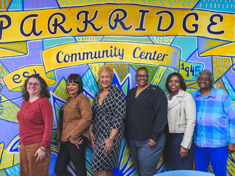 Gail Wolkoff, Loviesa Brown, Cheryl Harvey, Jeanice Townsend, Creola Larkin, and Josephine Taylor at a Monday morning meeting.
