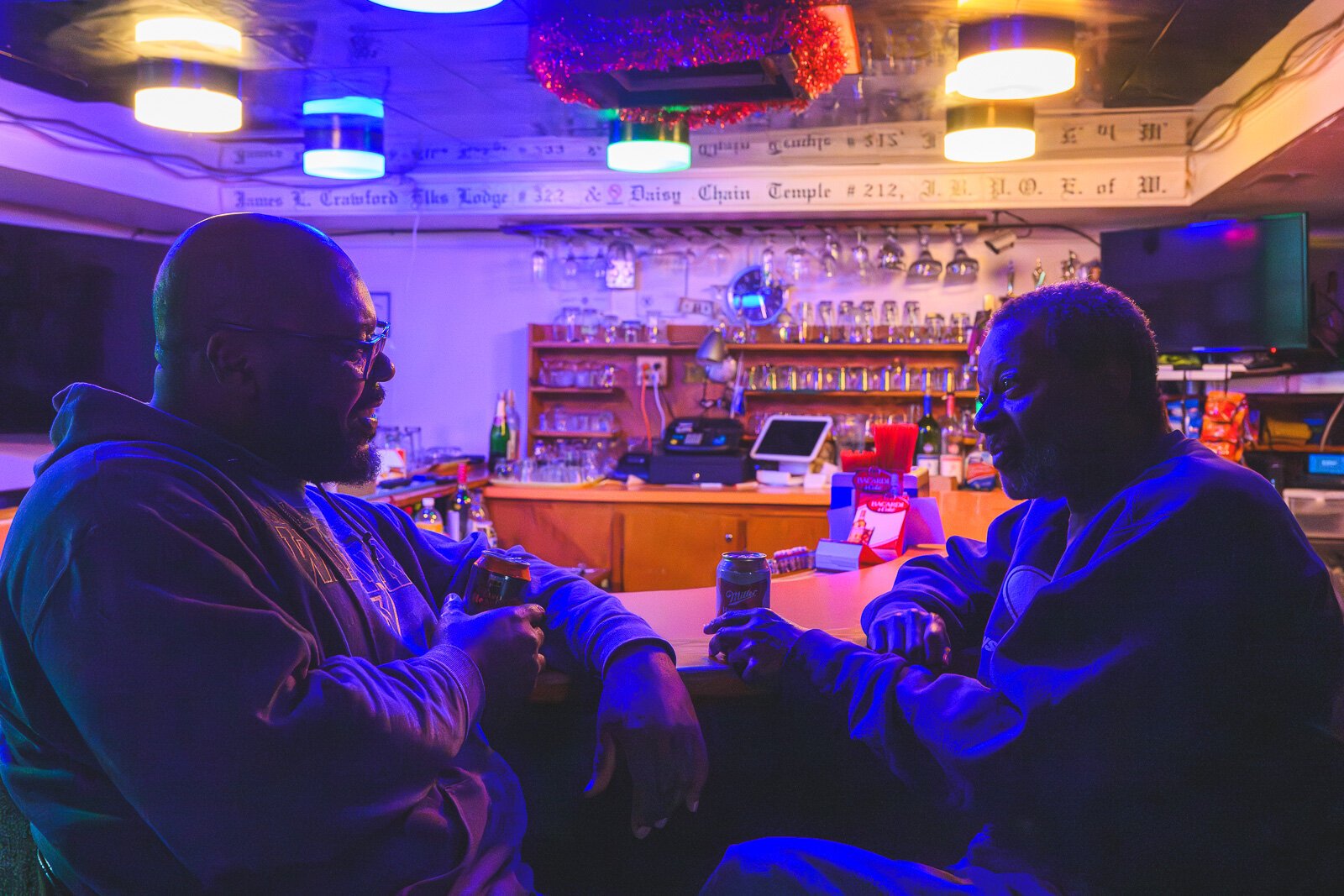 Andre Watson and Gregory Pee at the basement lounge of the James L. Crawford Elks Lodge.
