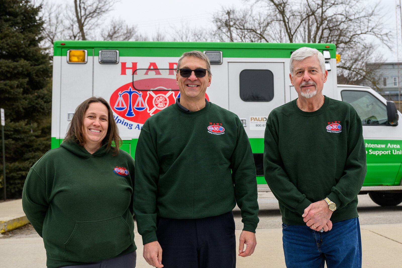 Emily East, Doug Armstrong, and Roger Simpson with the HART van.