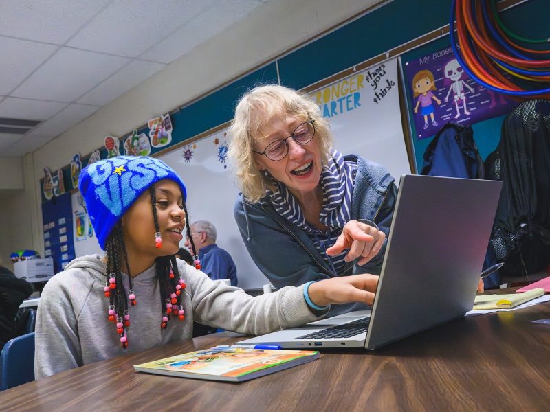 Tutors working with students at Erickson Elementary in Ypsilanti.
