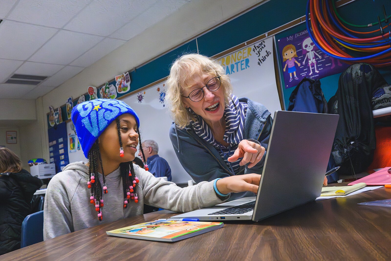 Tutors working with students at Erickson Elementary in Ypsilanti.