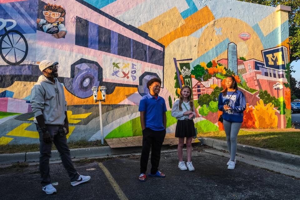 This mural project in Ypsilanti, a collaboration between adult muralist Gary Horton and local teens, was facilitated by members of Embracing Our Differences.