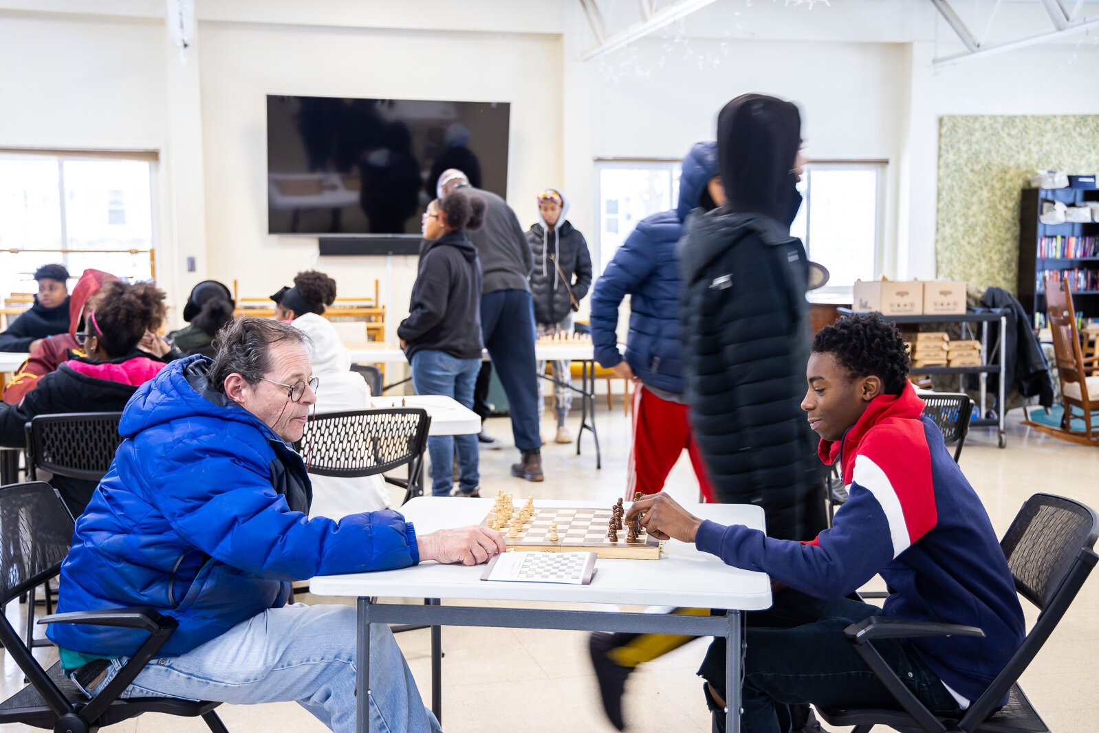An intergenerational chess event at the Ypsilanti Senior Center.