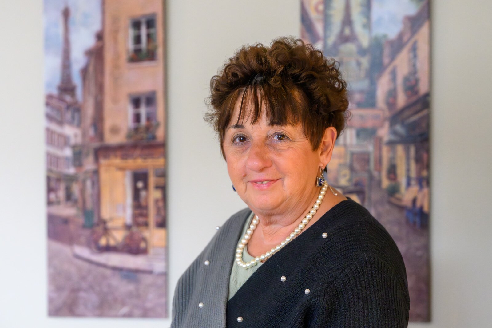 Maria Munteanu in her apartment at Hilltop View Apartments.