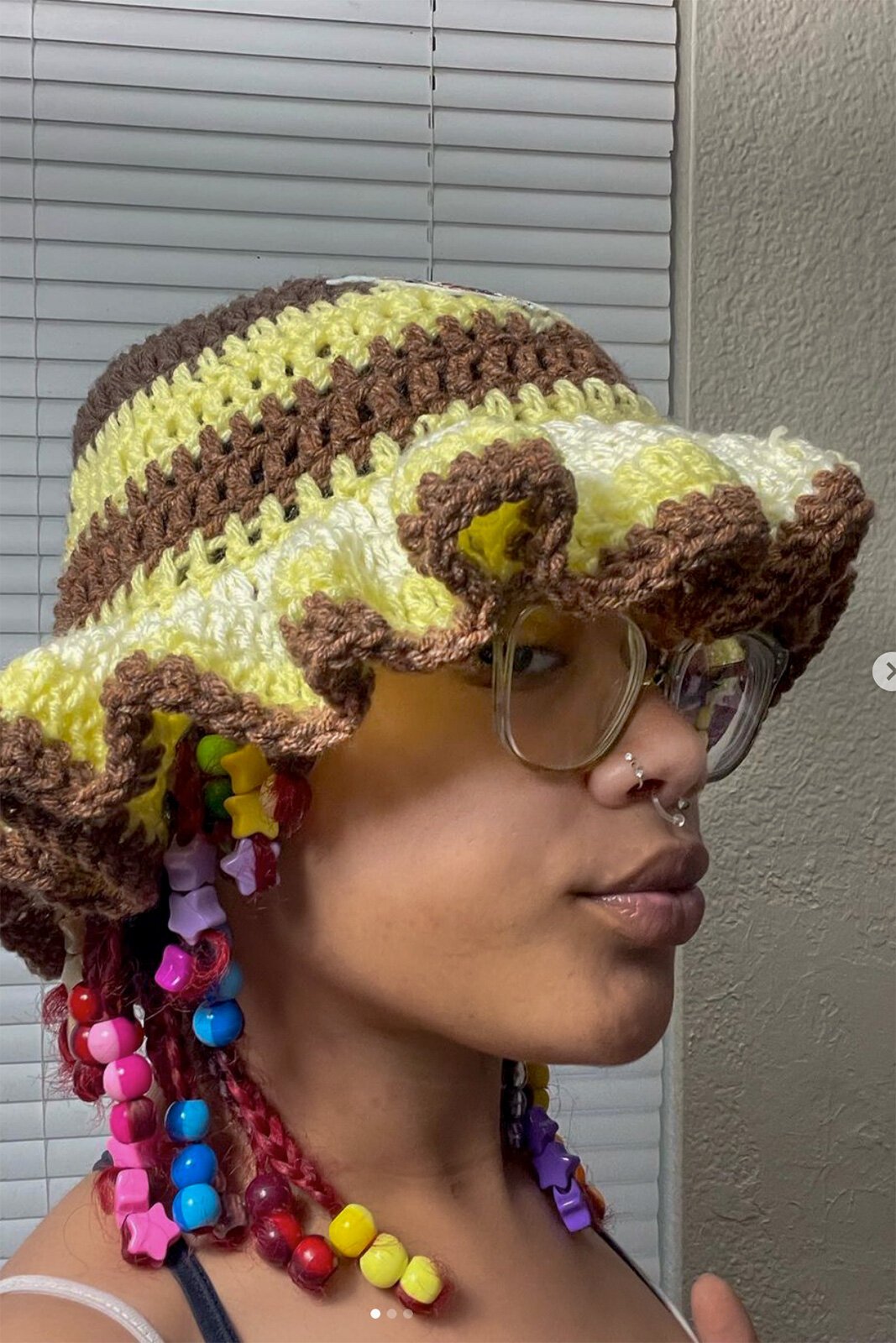 Micah Ferguson modeling a Bizarre Trinkets hat.