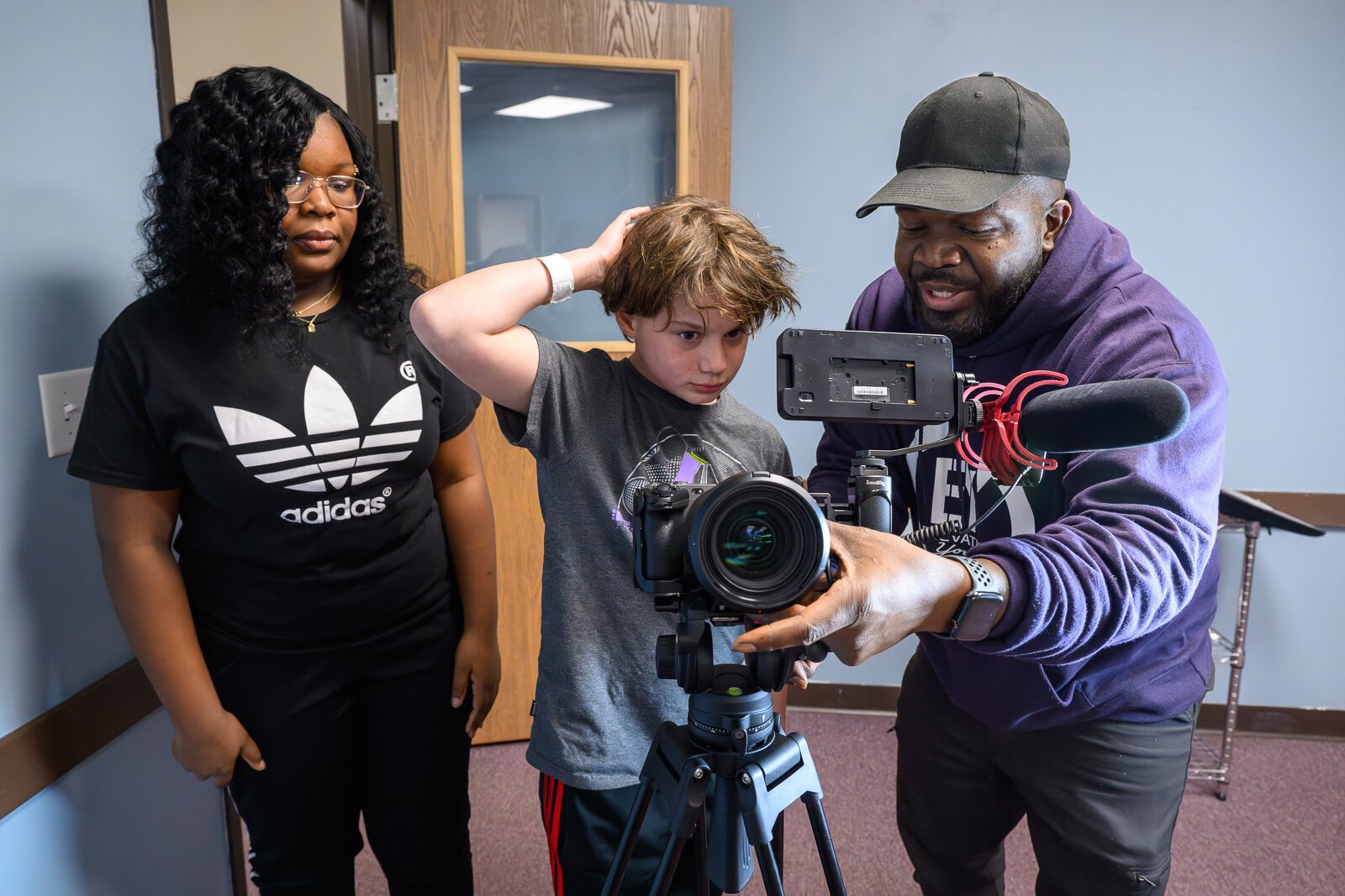 Keith Ragland (right) leading a podcasting workshop at Elevation Youth Corps with Elleona Ragland and Skyler Shaw-Hillman.