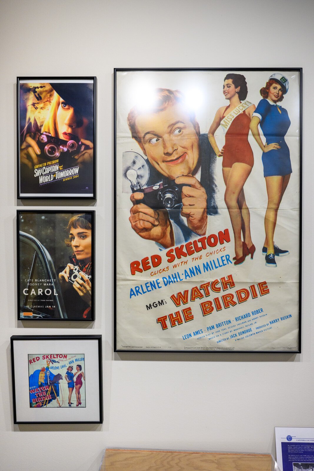 Movie posters with Argus cameras on display.